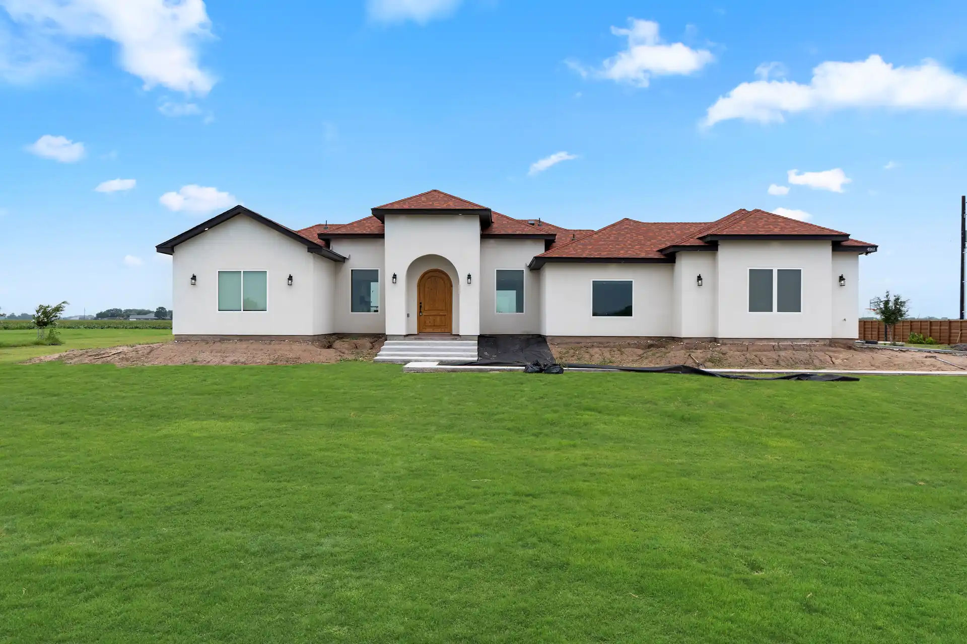 Spanish-Style Estate in Harlingen, TX — custom home built by Go To Guys RGV