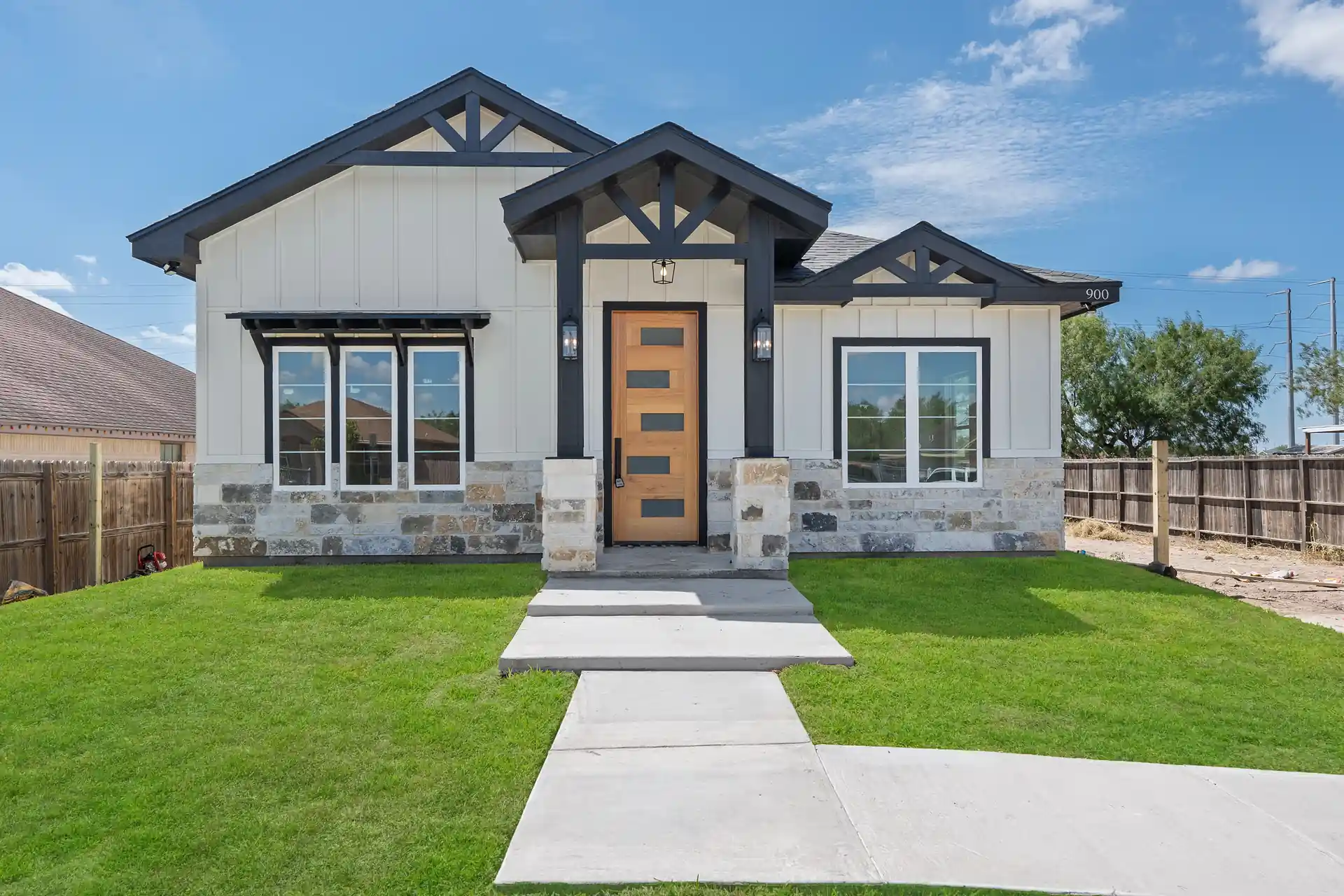 Board & Batten Farmhouse in Edinburg, TX — custom home built by Go To Guys RGV